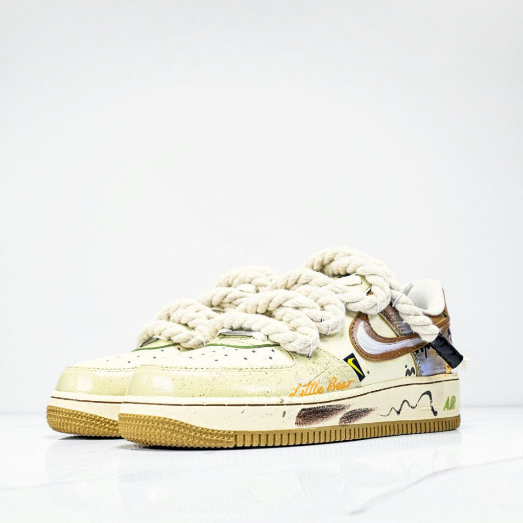 A hand-drawn bear and rope laces