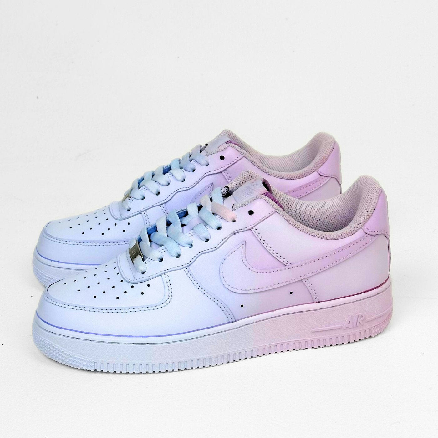 A pink-to-blue gradient fade