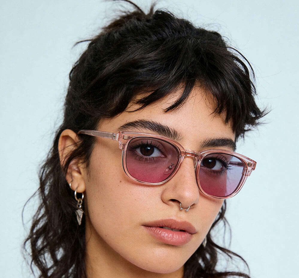 Tinted lenses in a clear frame