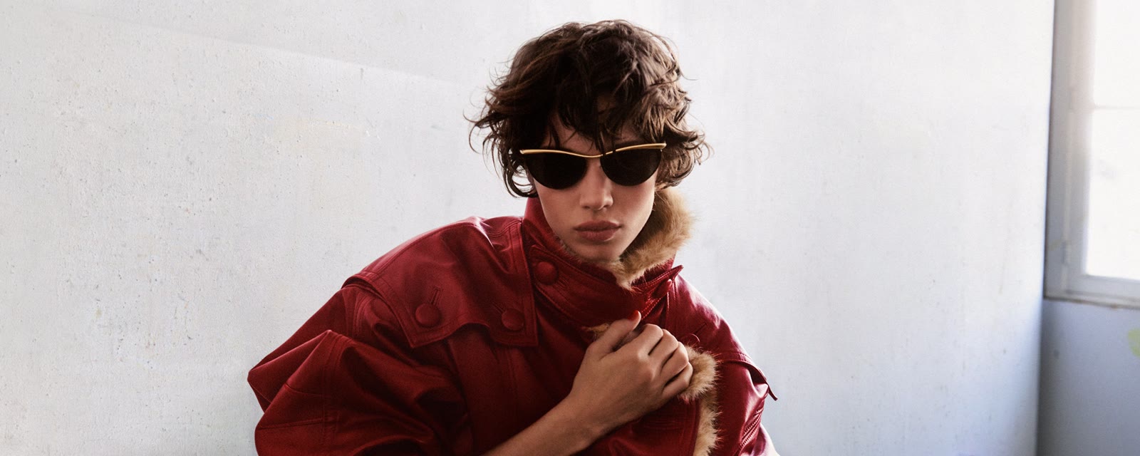 Sunglasses and a red leather jacket