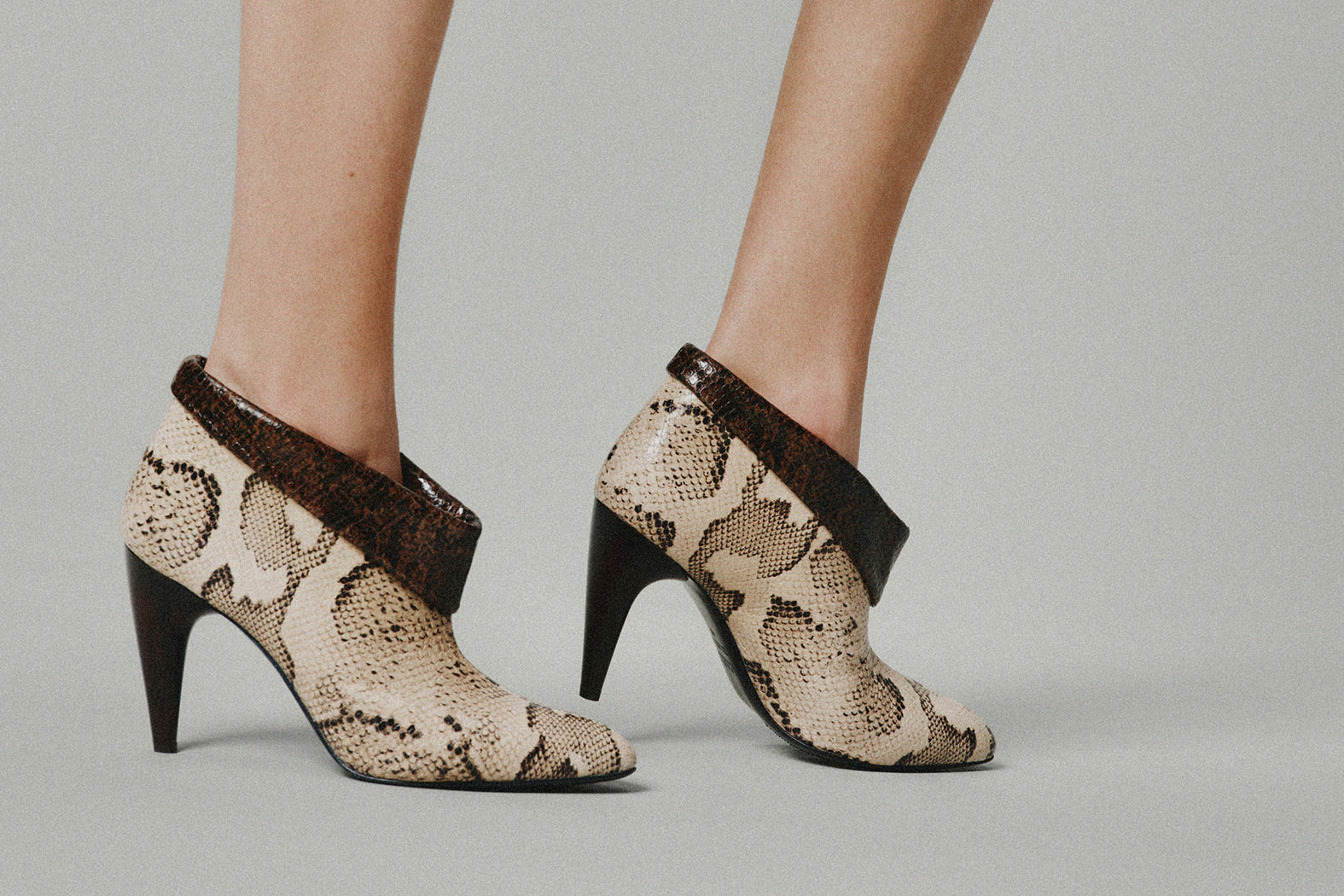 Snake-print ankle boots