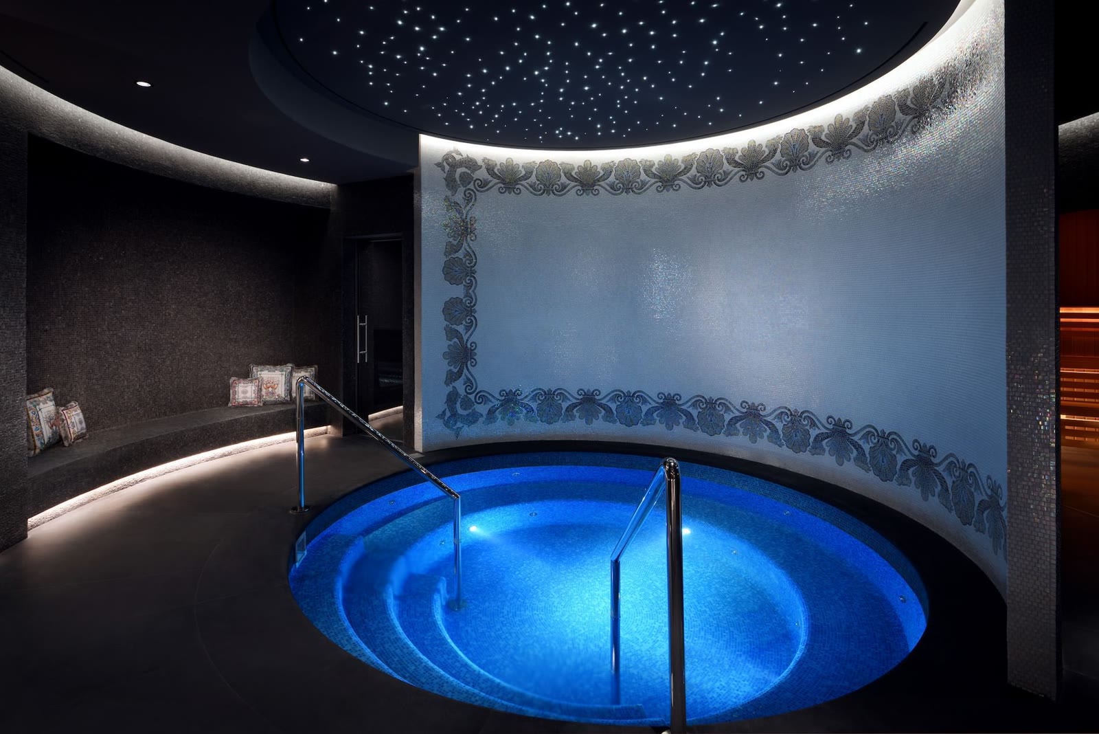 Spa pools under a starlit ceiling