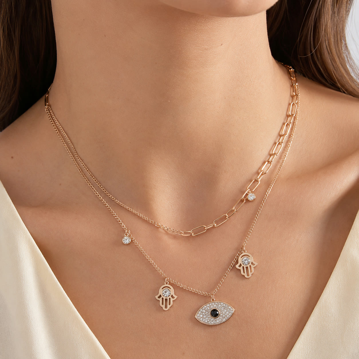 Layered necklaces with charms