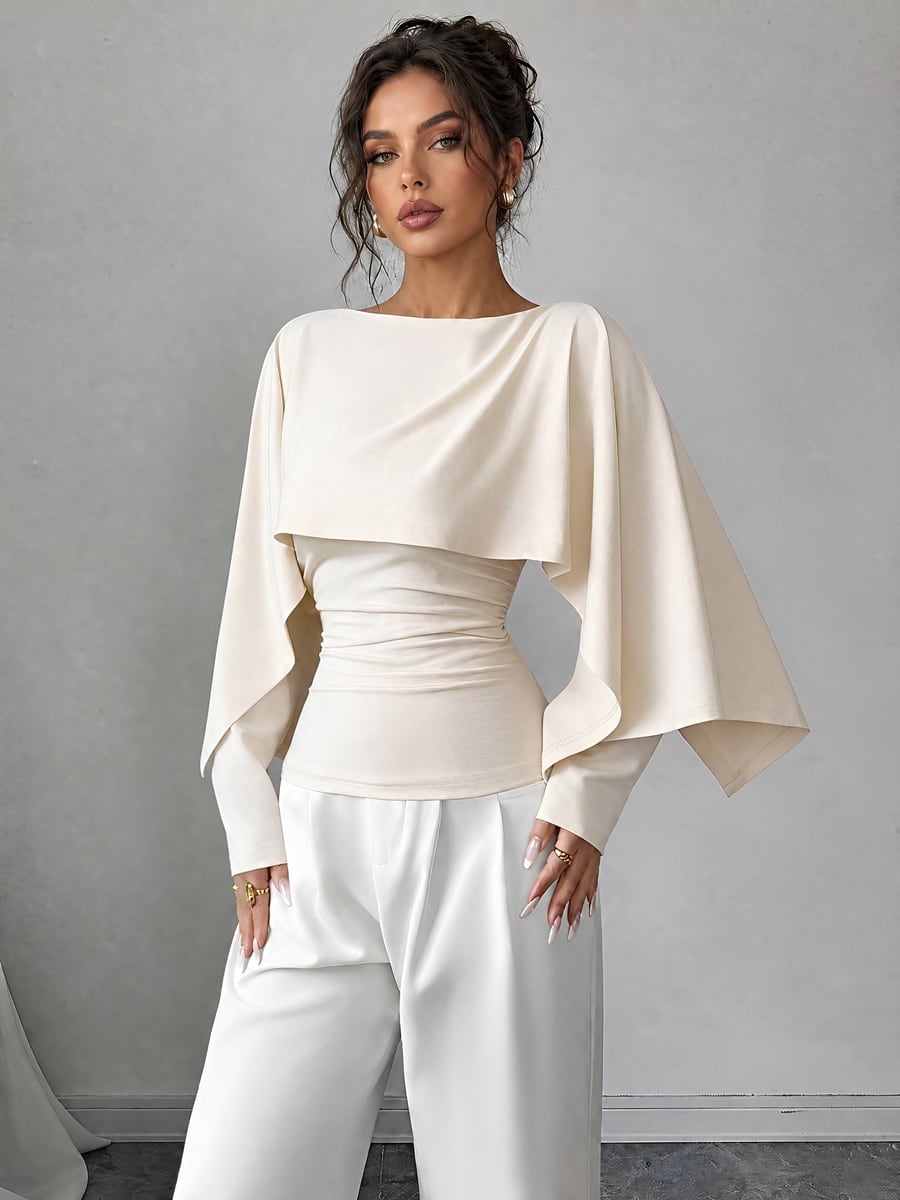 Front view in apricot with white trousers