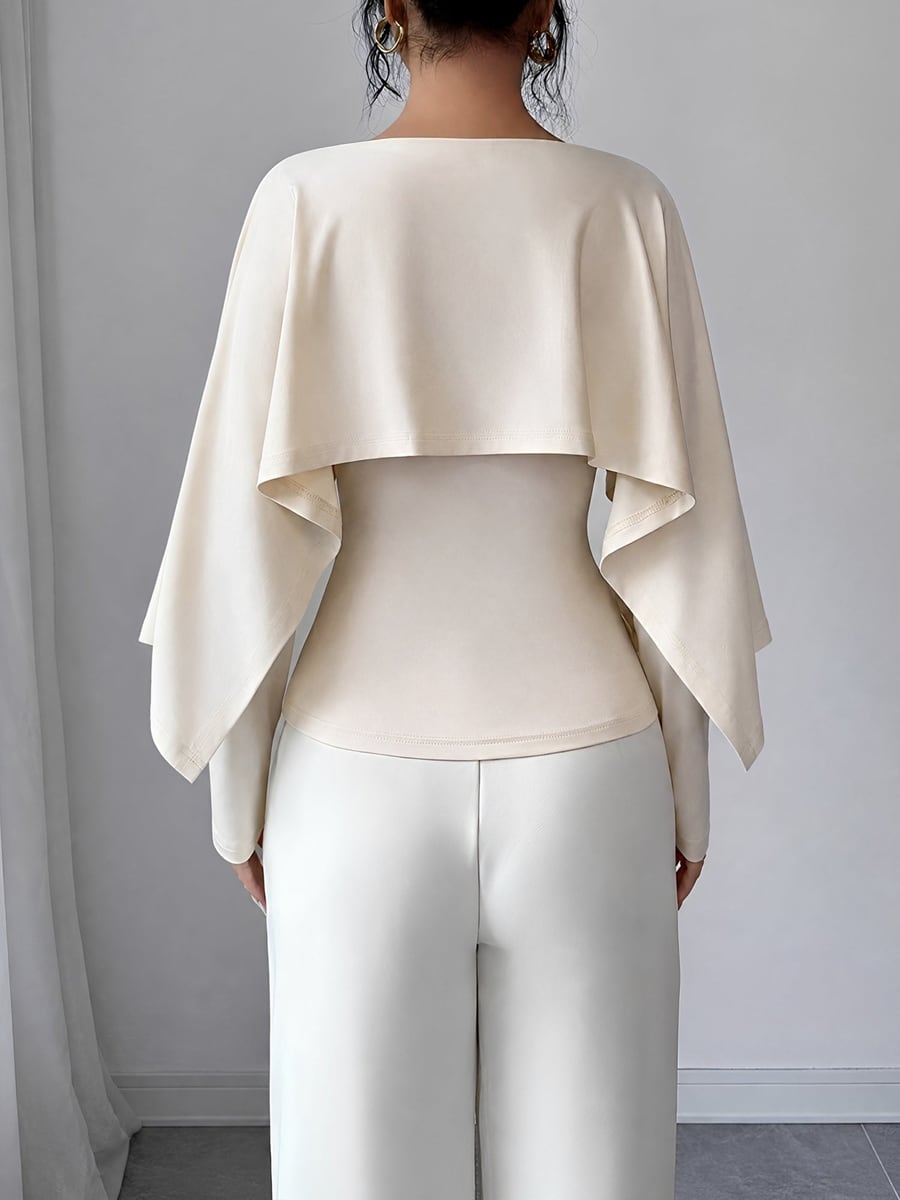 Back view showing the cape