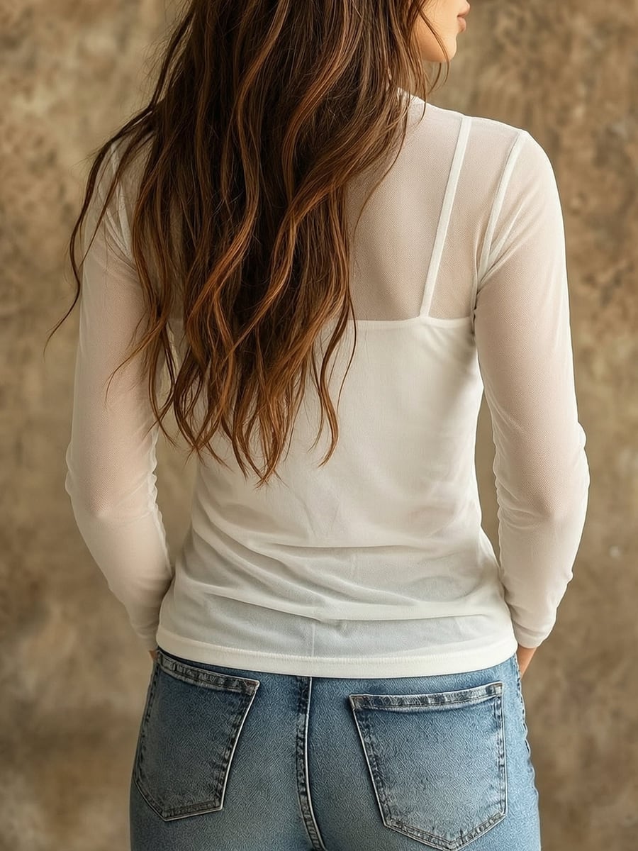 Back view in white with the cami showing through