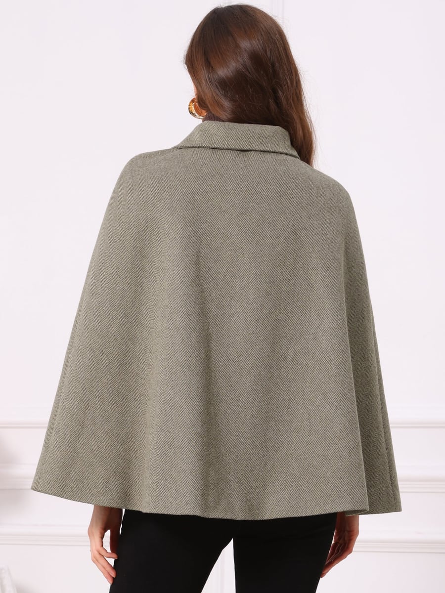 Back view with the cape falling wide