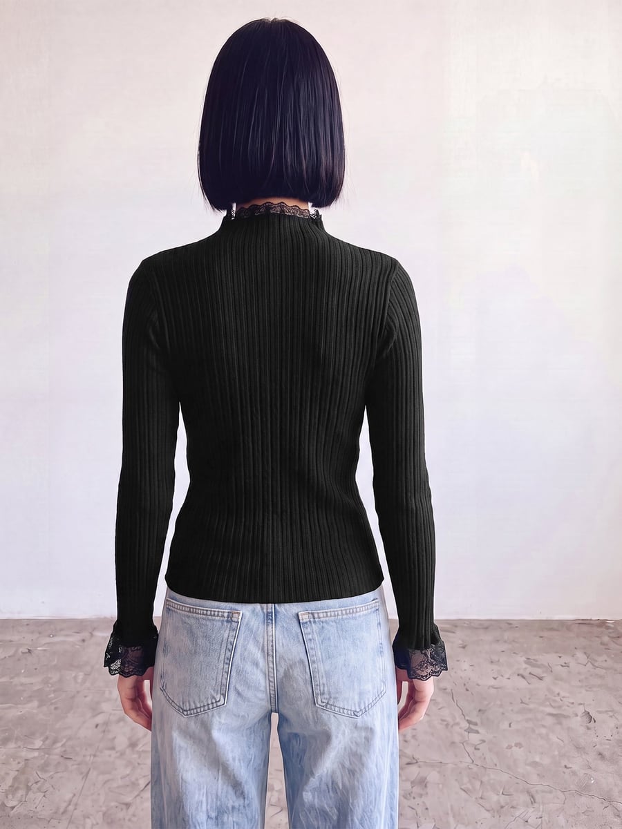 Back view showing the lace cuffs