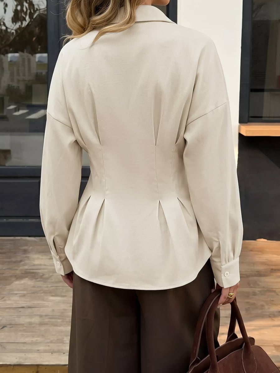 Back view showing the waist pleats