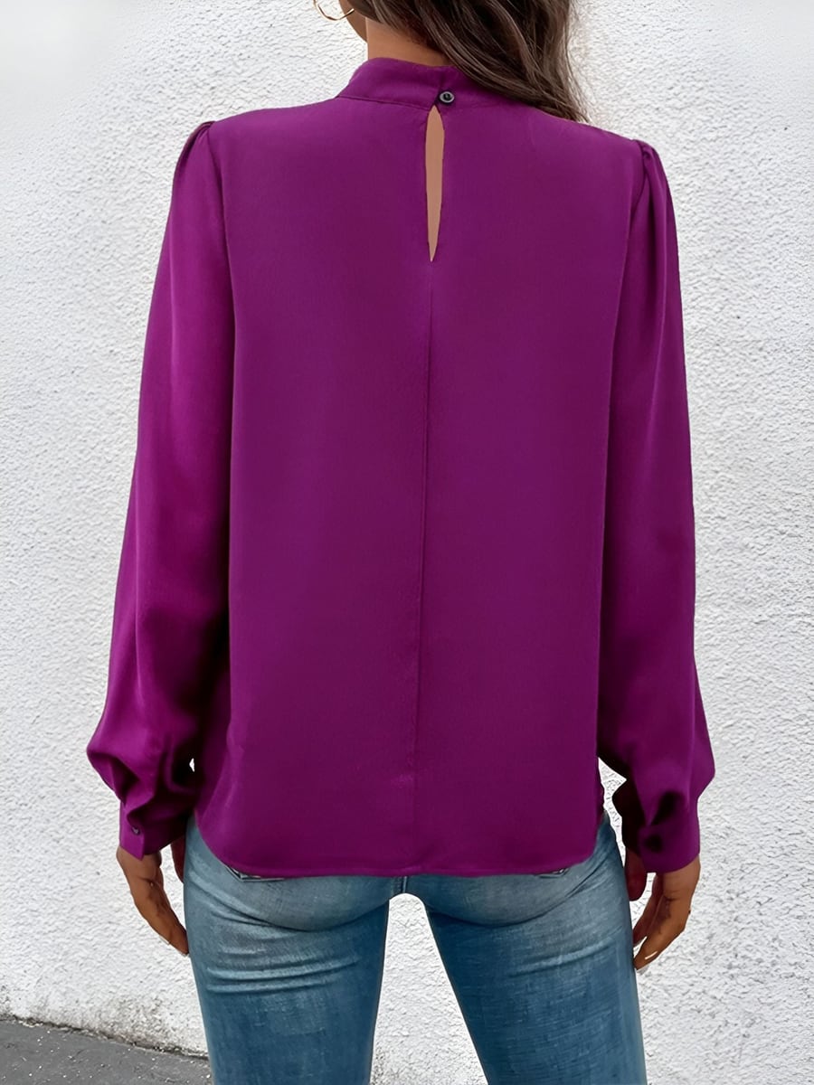 Back view showing the keyhole and button
