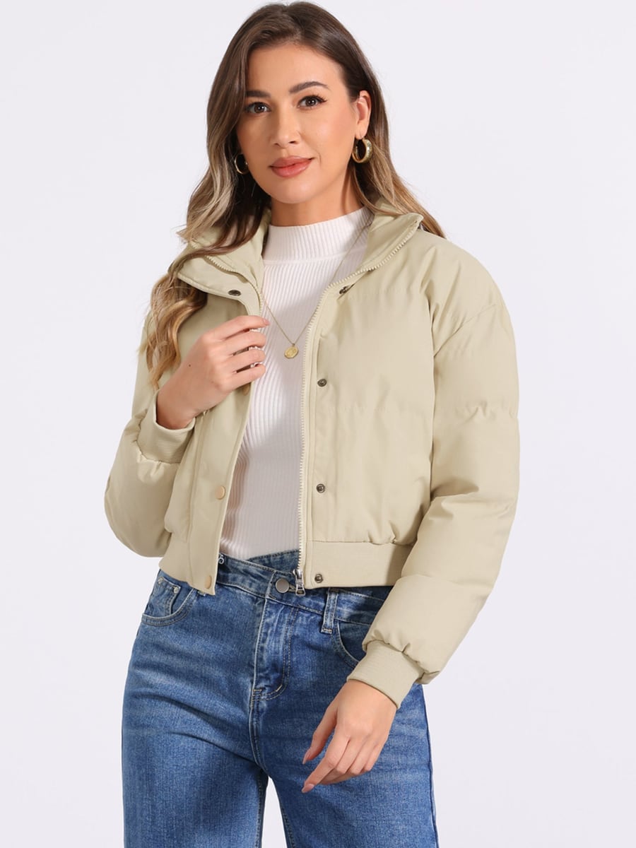 Front view, beige puffer worn open