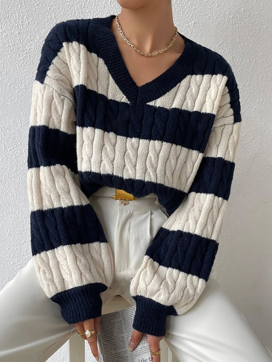 Upper body showing the V-neck and cables