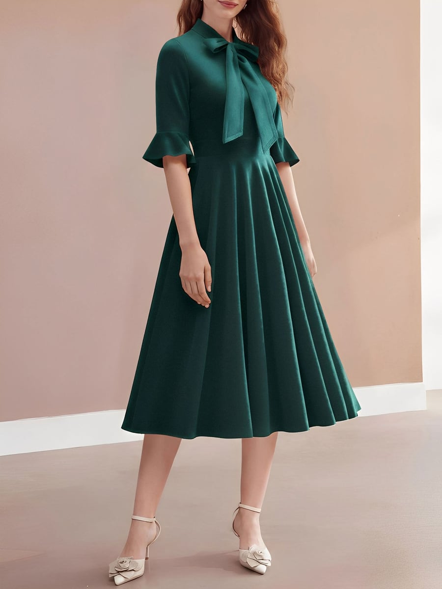 Front view in dark green velvet