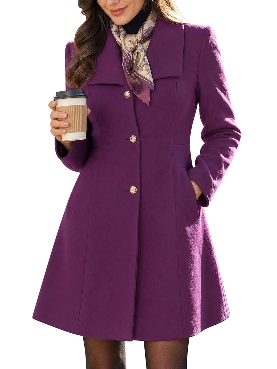 Front view, purple coat with a scarf and a coffee