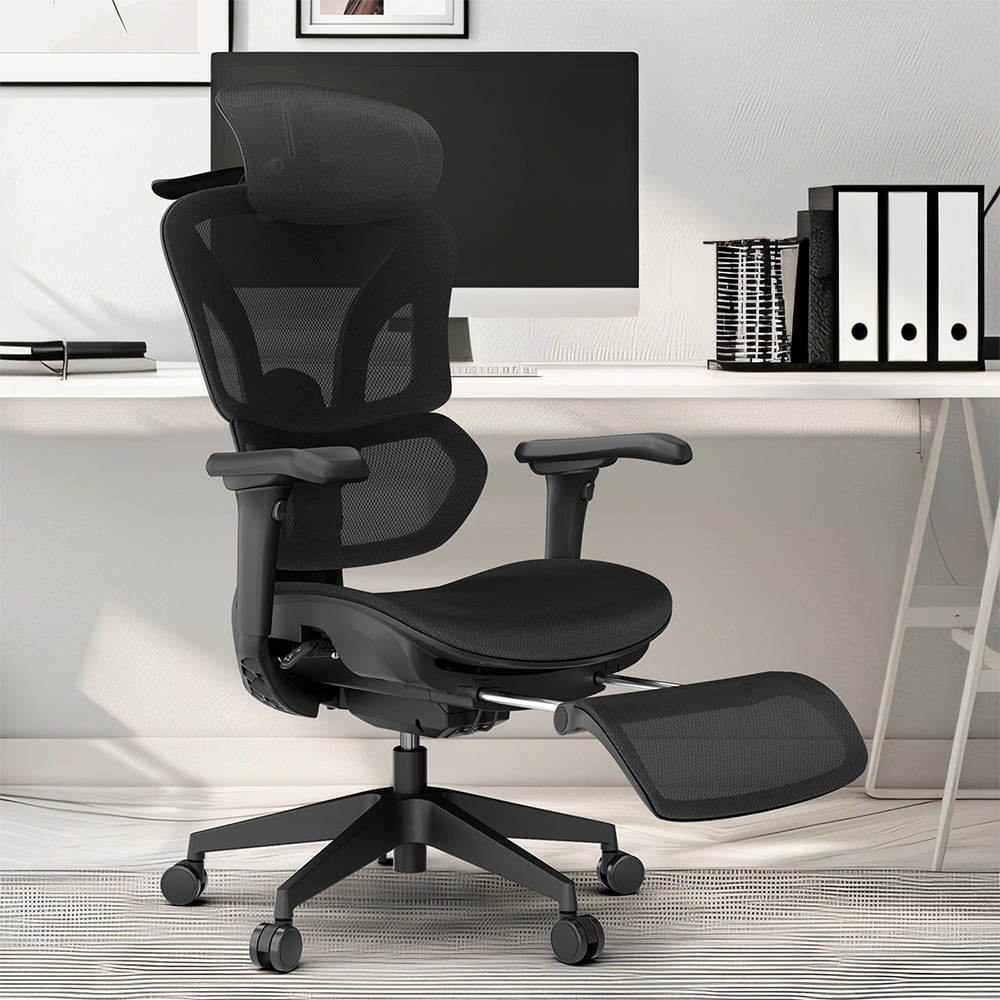 At a desk with the footrest extended