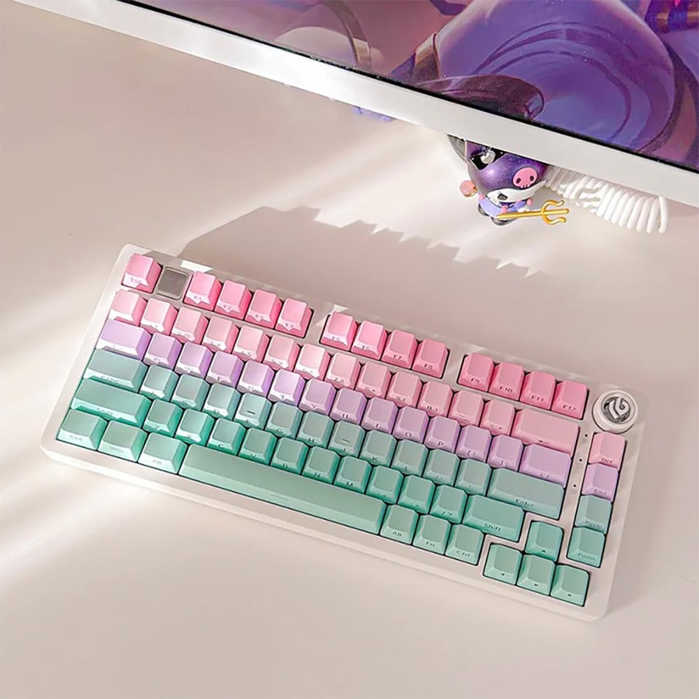 On a desk in front of a monitor