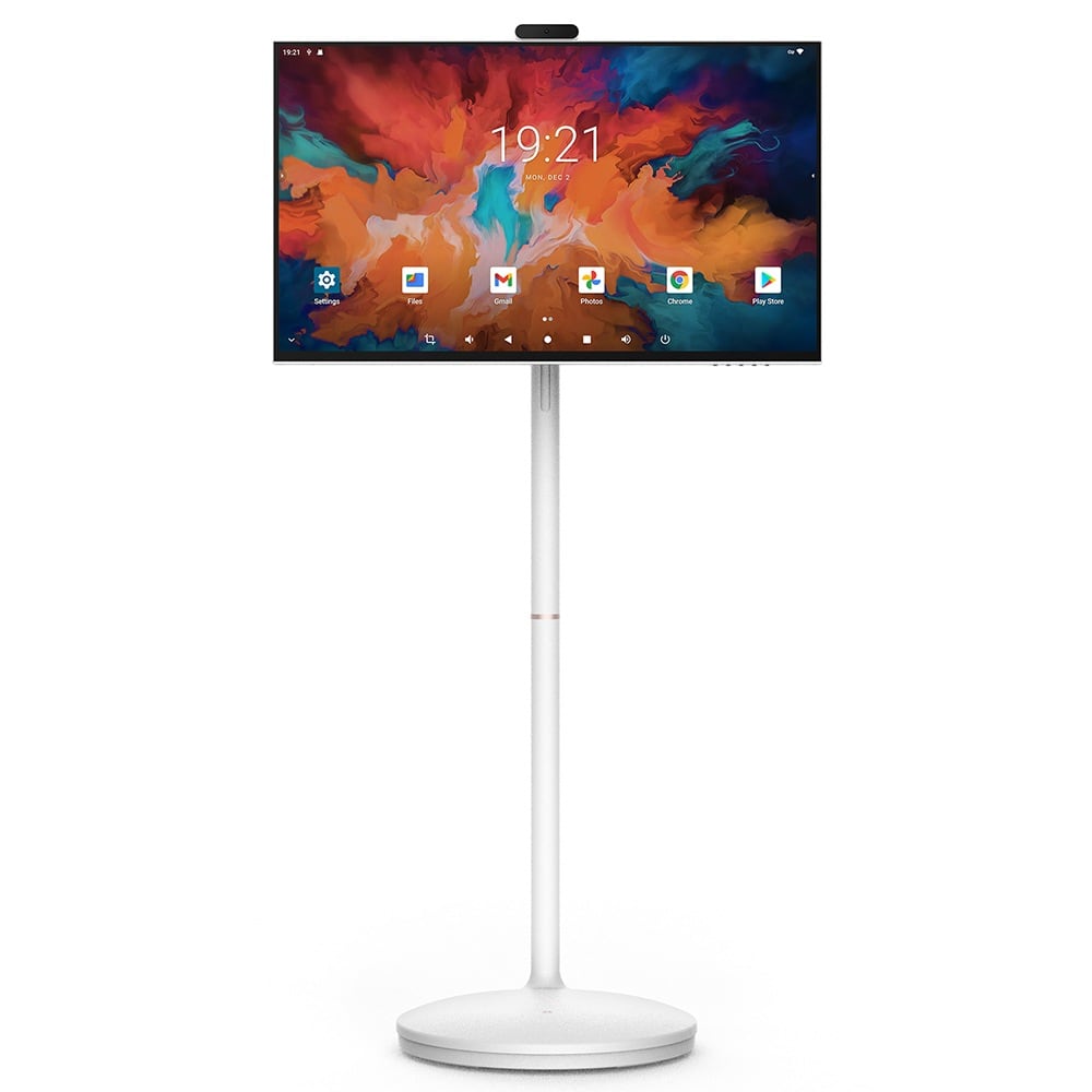 La pantalla de 32" en su soporte blanco de base redonda