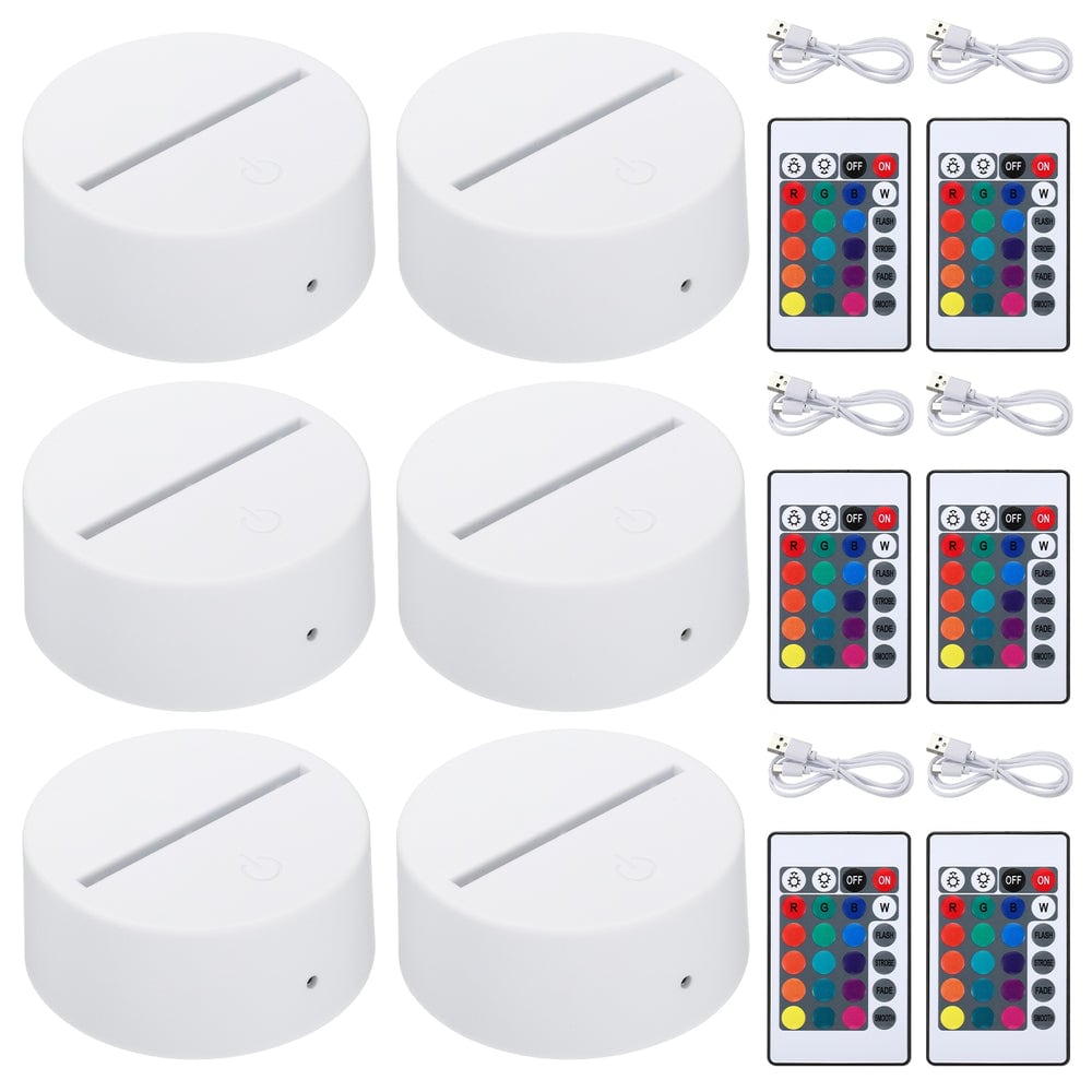 Seis bases con mandos y cables USB