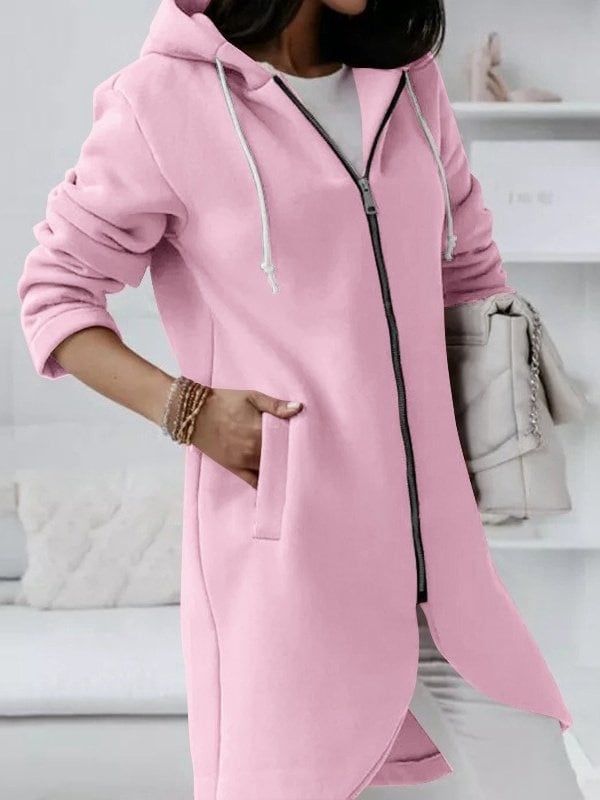 Versión rosa con la mano en el bolsillo