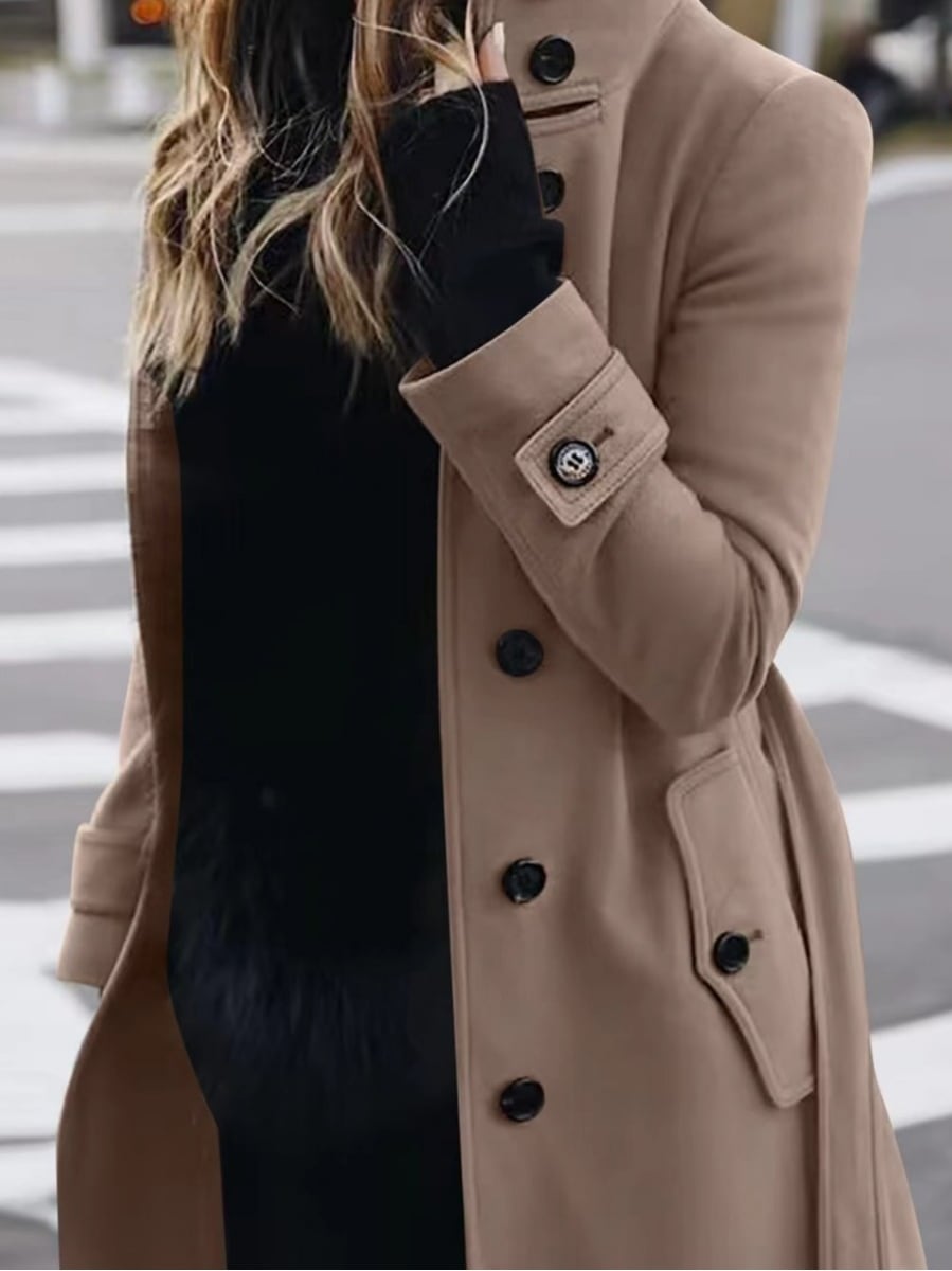 The coat in khaki, worn