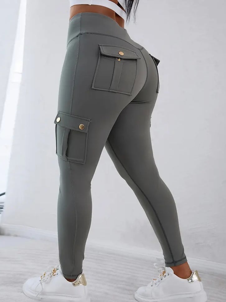 The leggings in deep gray, worn
