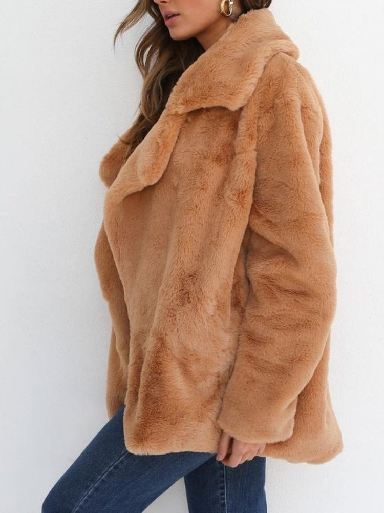 The brown jacket worn open, from the side