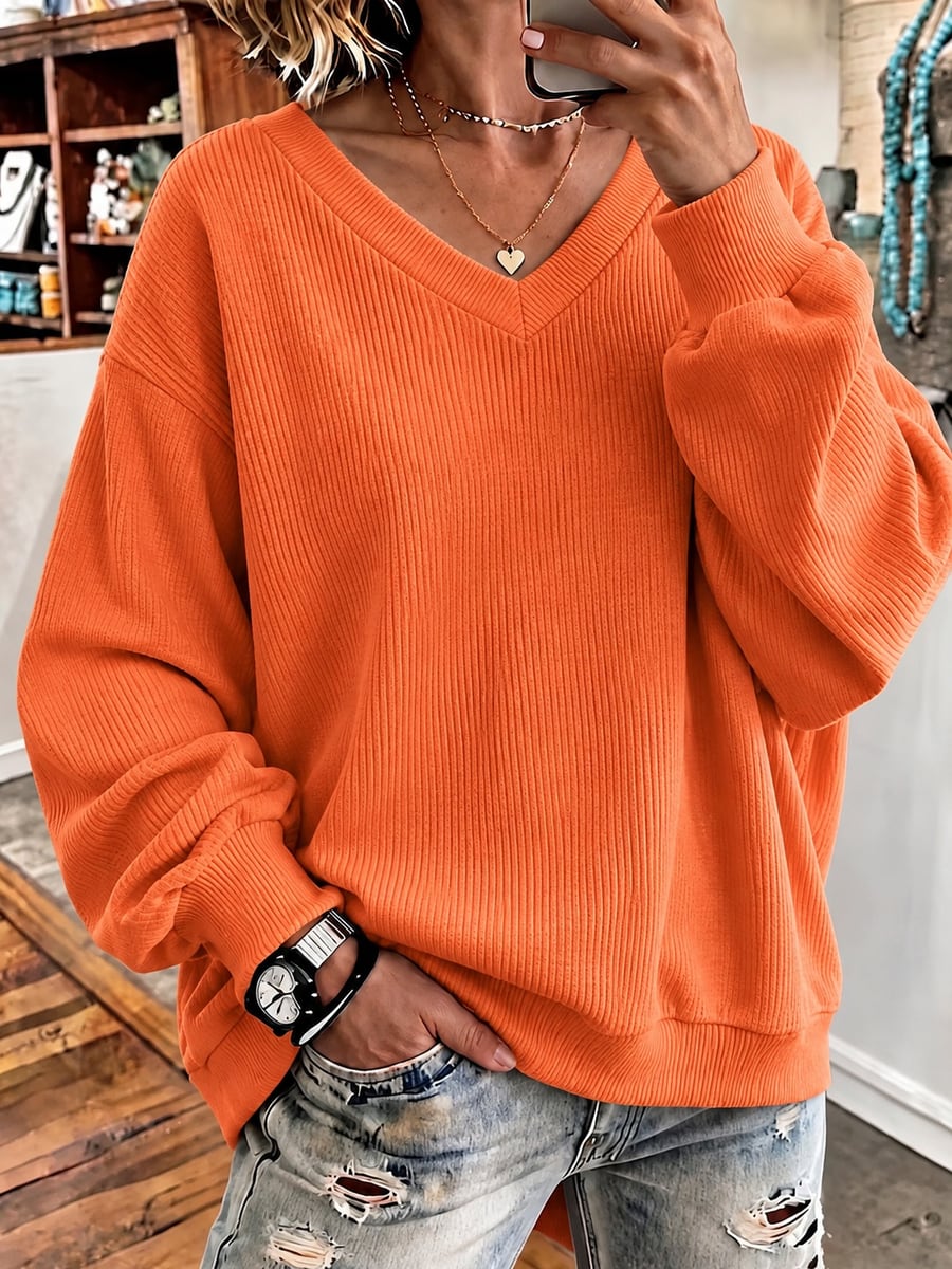 La sudadera naranja de frente