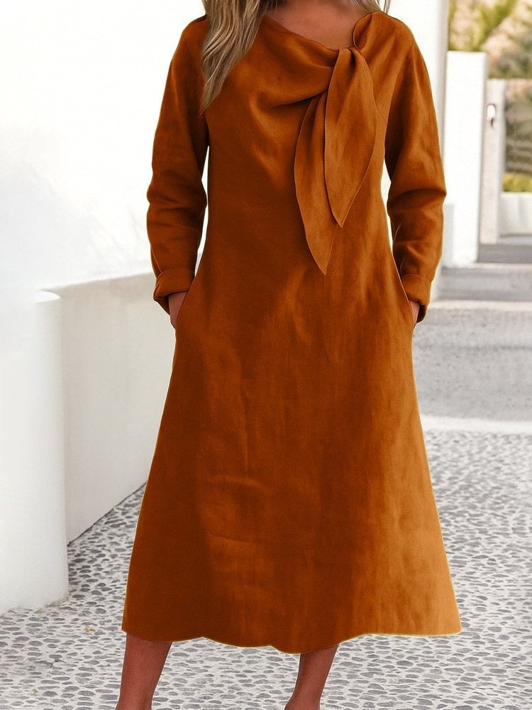El vestido marrón claro, de cuerpo entero