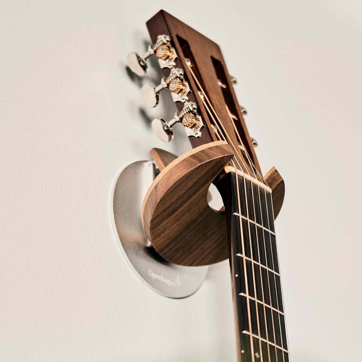 Walnut mount holding a headstock
