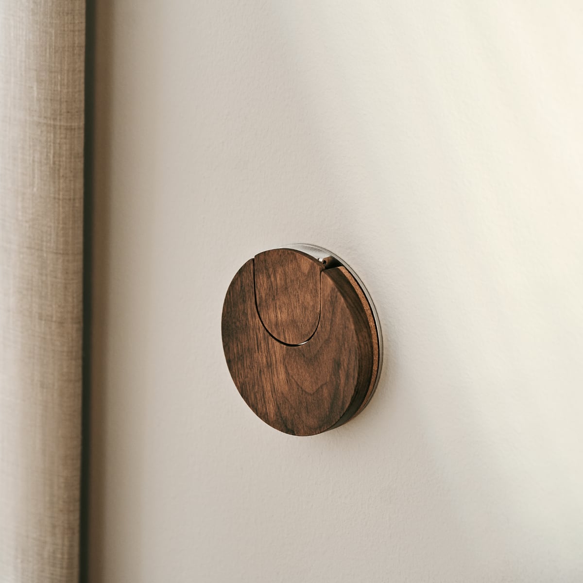 Folded flat on the wall