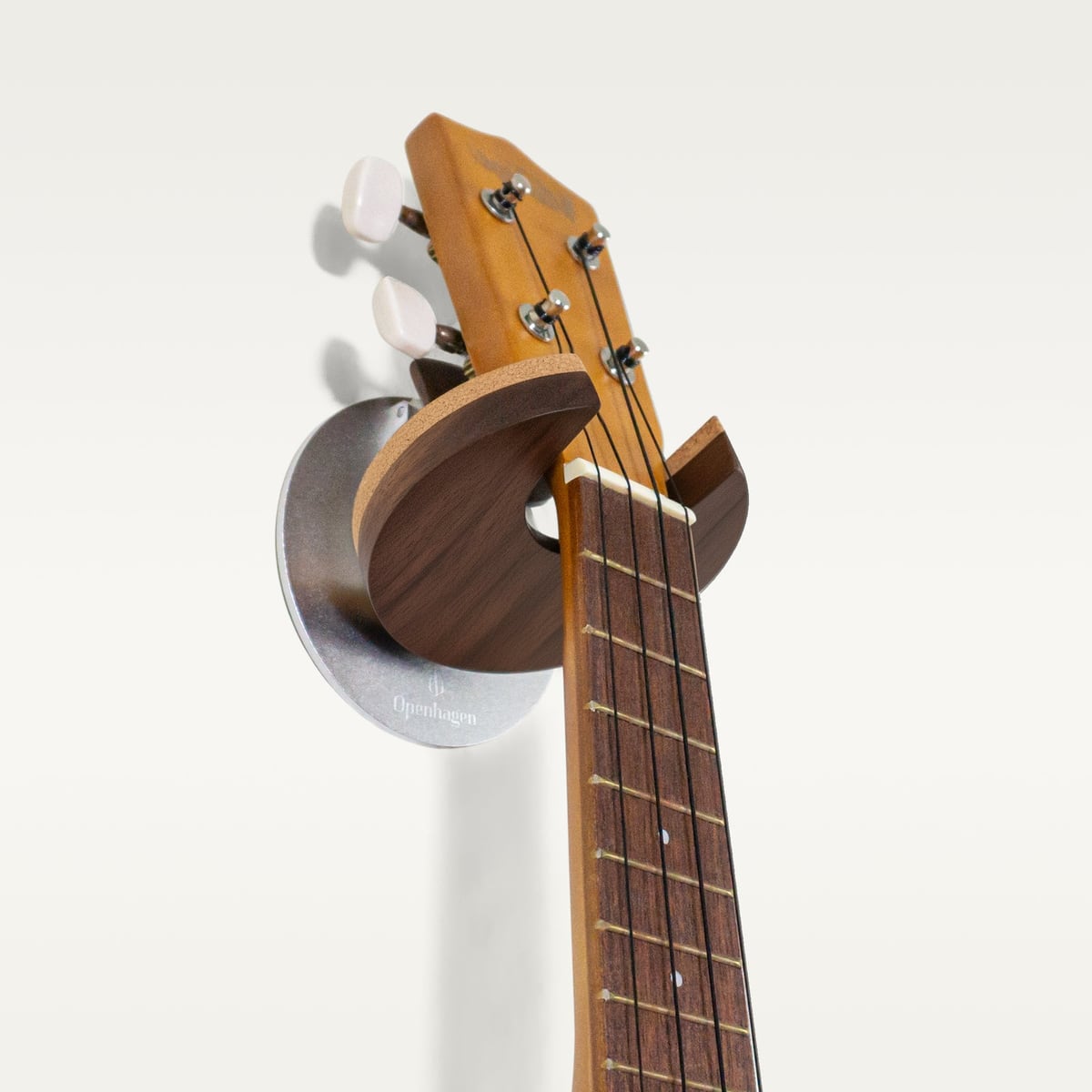 Walnut mount holding a headstock