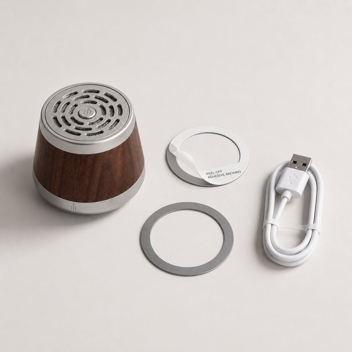 The speaker with magnetic rings and USB-C cable