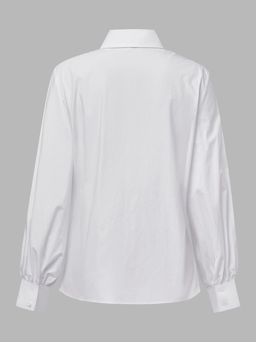 The shirt laid flat, back